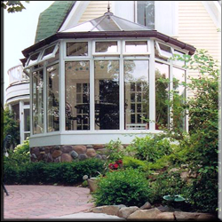 Image of Victorian Conservatory with Bronze roof, stone kneewal.