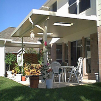 photo of solid, insulated, studio-style patio cover w/ skylights.